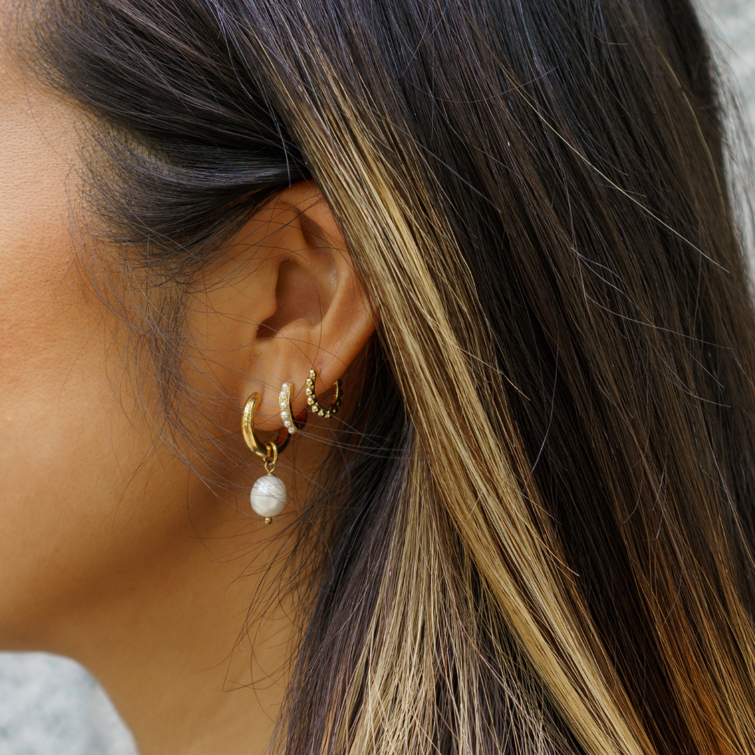 Pearl Of The Ocean Hoops | 18K gold plated | 925 | Slay jewellery | Stacked | modern | bold | limitless | hoops | ear stack | huggies | stackable | layered | everyday | demi fine | shell earrings | drop earrings | minimalist | gold | silver | small huggie | thick huggie | huggie hoop | chunky earrings | thick hoops | cz earring | nickel-free earrings | skin-friendly earrings | pearl earrings | pearl drop hoop | pearl cluster earring